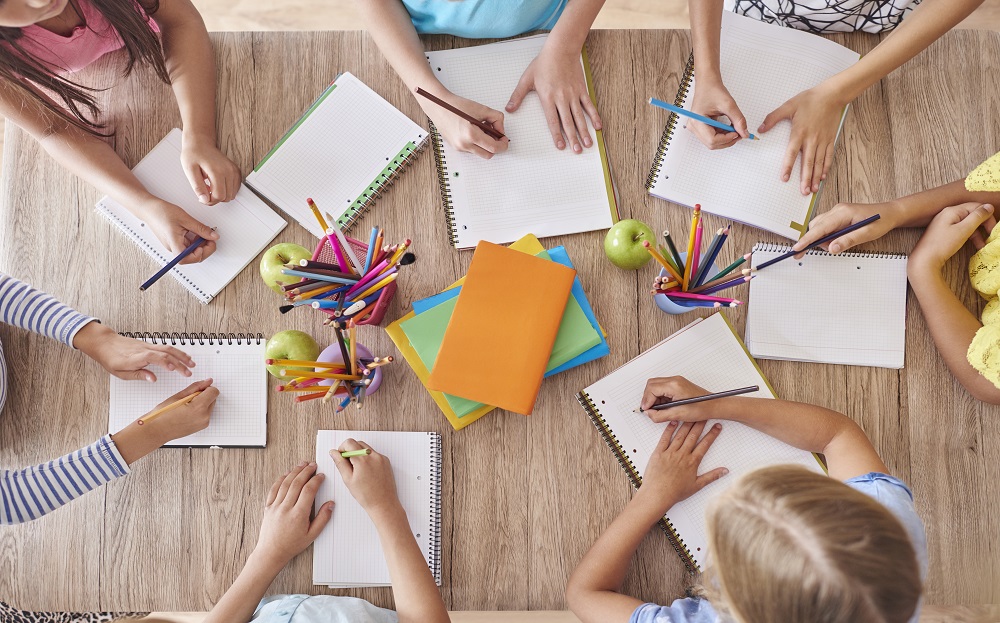 kids around the school table